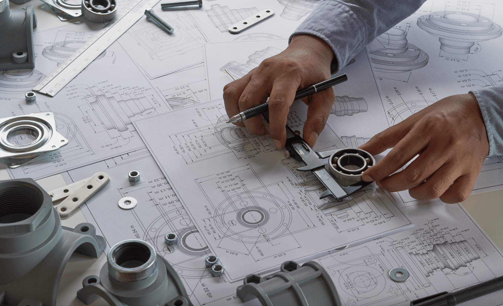 Engineer technician designing drawings