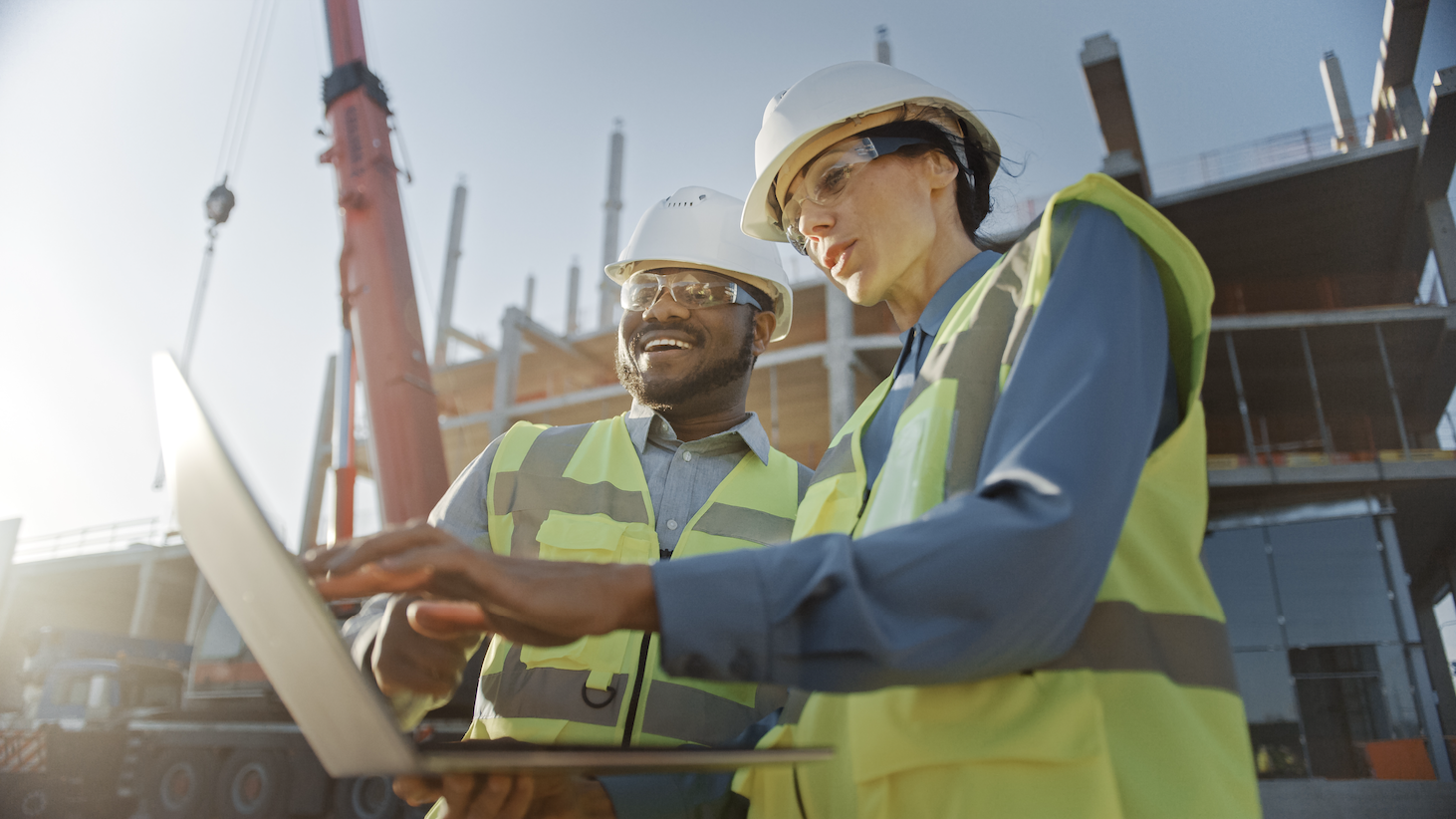 Two Specialists Inspect Commercial, Industrial Building Construction Site